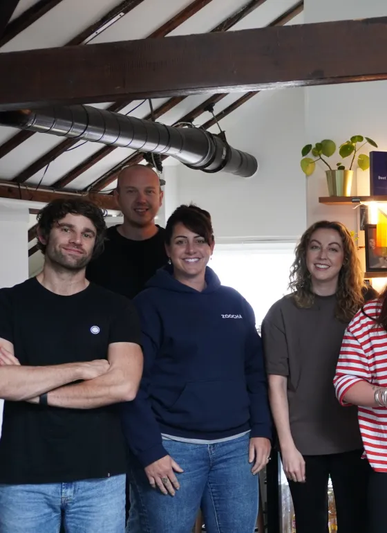 Team photo with balloons