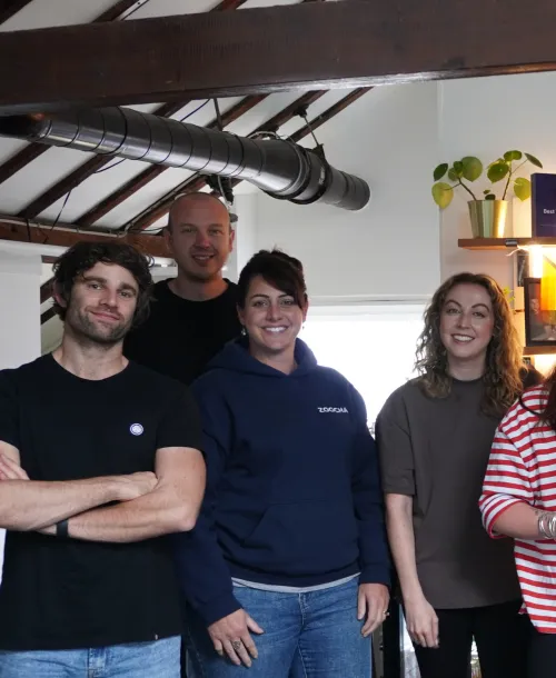 Team photo with balloons