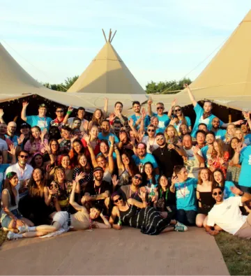Our team at Zoochacon in front of a marquee